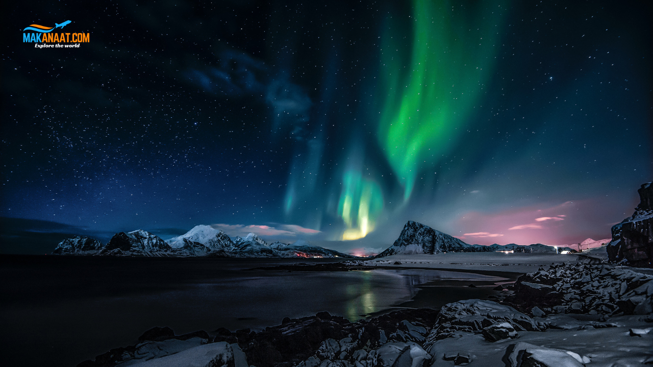 Dramatic Northern Lights over black sand beaches near Reykjavík Iceland 2026