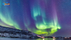 Northern Lights frame jagged Lofoten Islands mountains Norway solar storm 2026